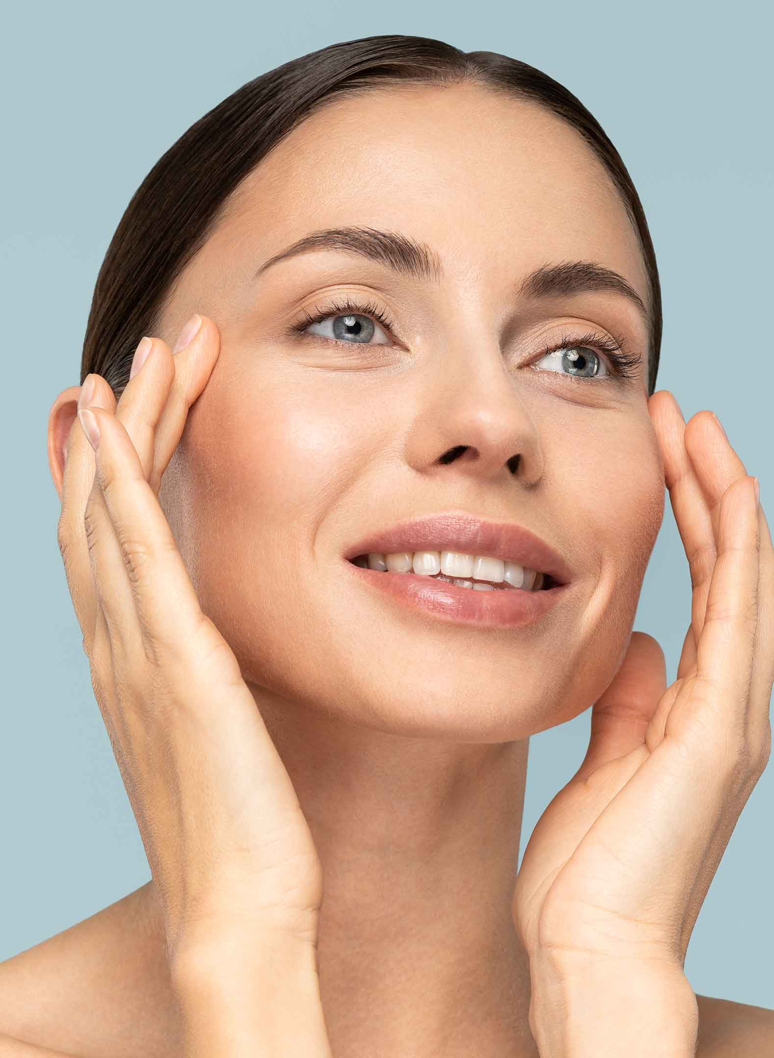 Model touching her face