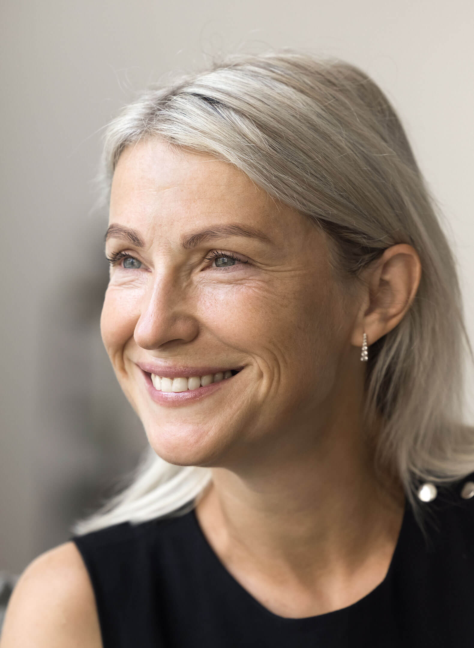 Mature woman smiling with dimples